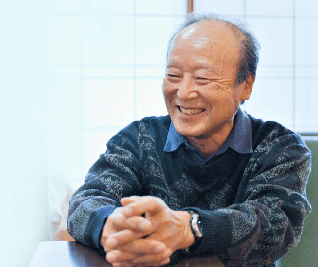 写真:理事長 長坂輝夫